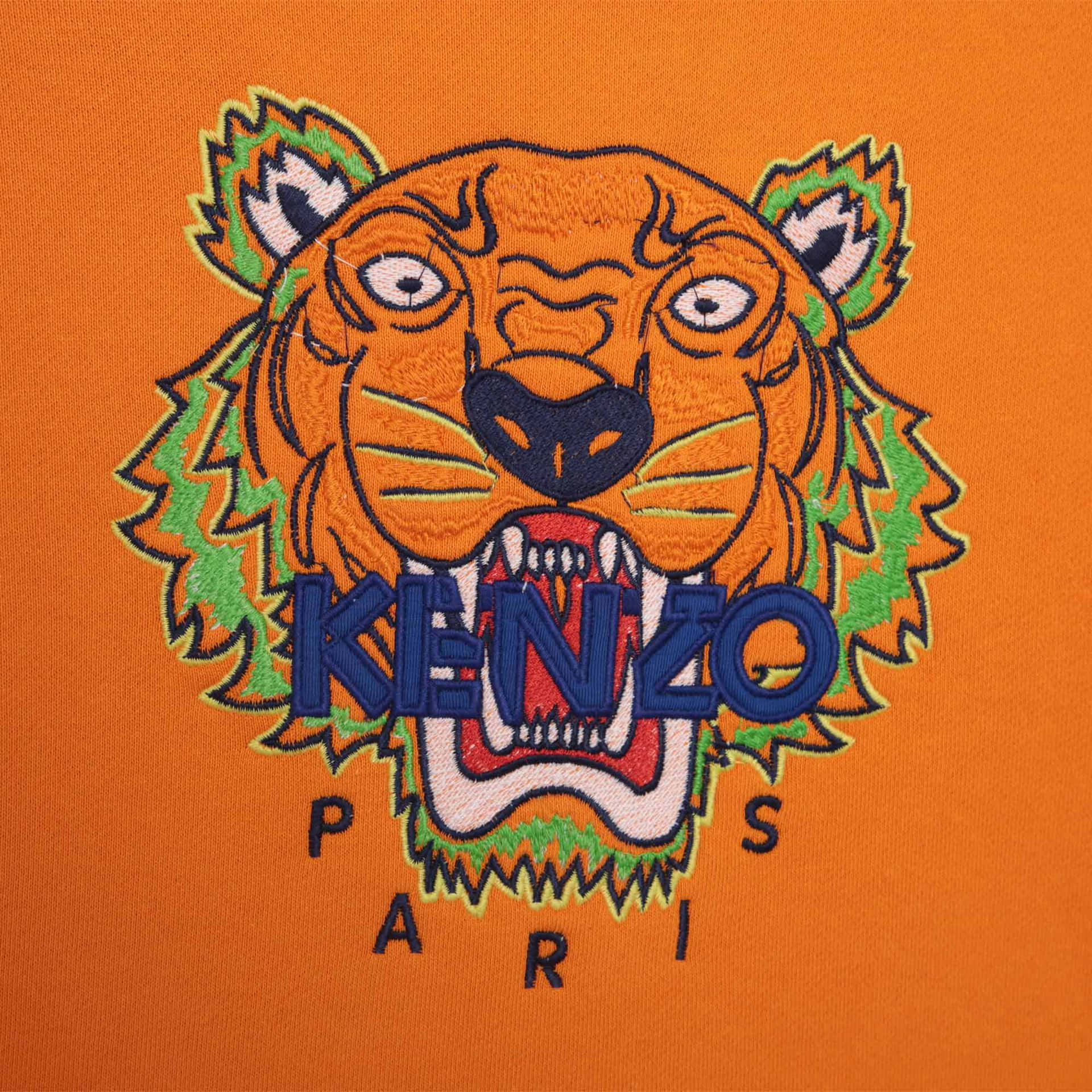 Striking Embroidered Kenzo Tiger in Vibrant Orange Wallpaper