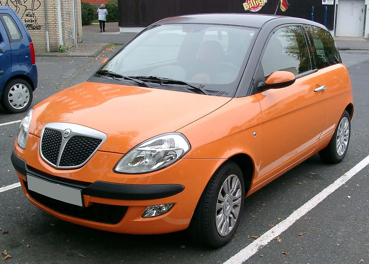 Lancia Ypsilon Orange Garée Fond d'écran