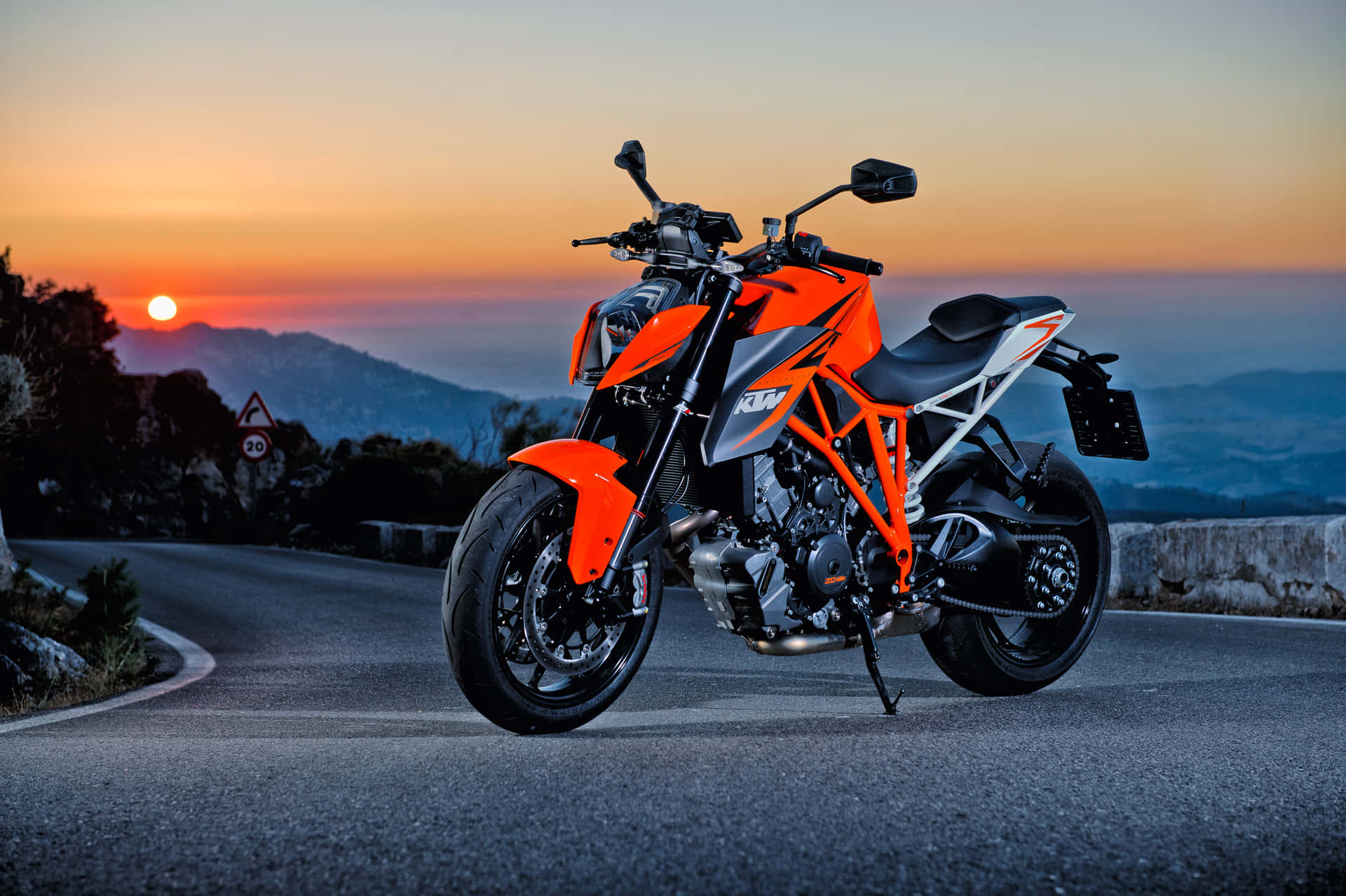 Orange Monster: A Stunning Shot Of A Ktm Motorbike Wallpaper