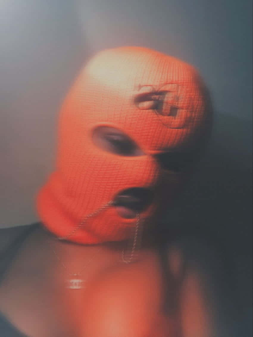 Orange Ski Mask Portrait Wallpaper