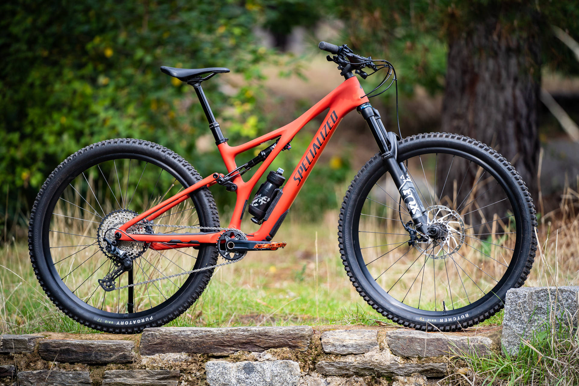 Vibrant Orange Specialized Bike in the Great Outdoors Wallpaper