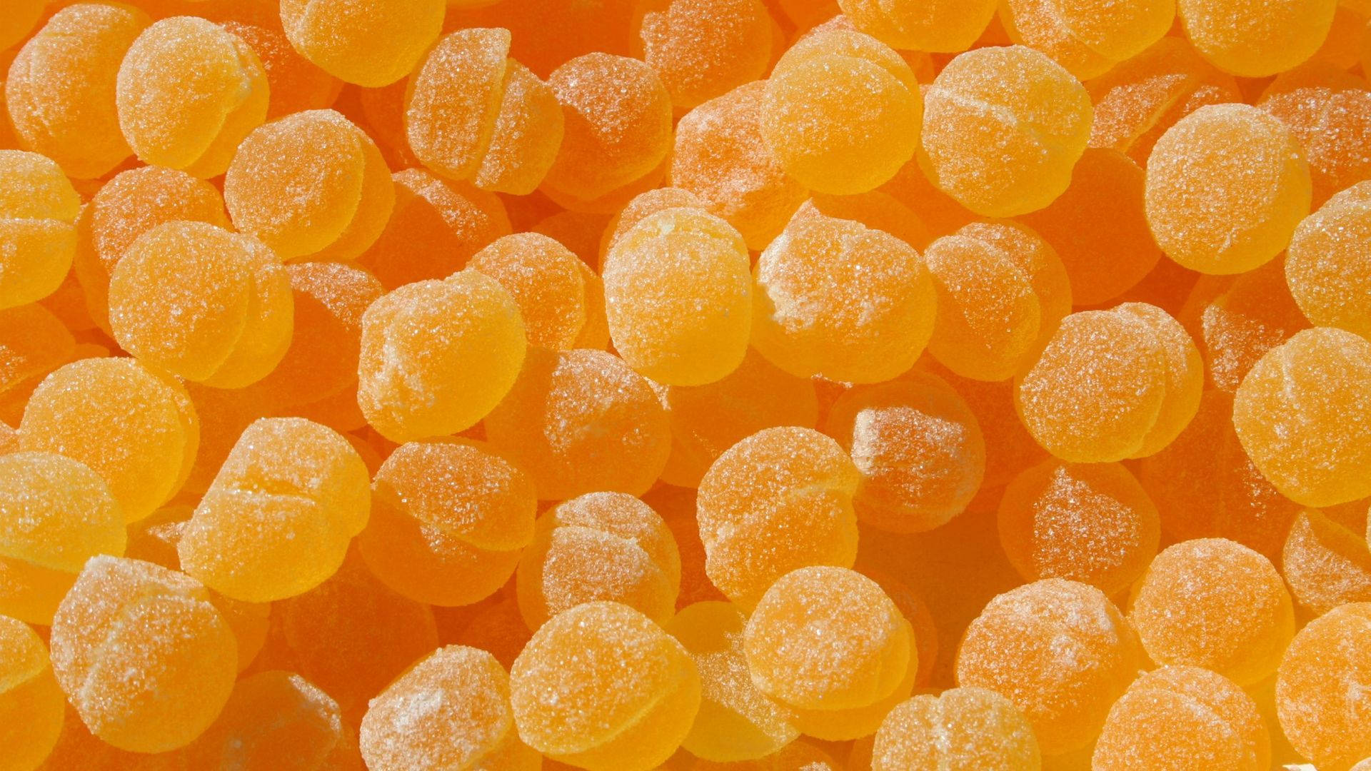 Caramelosde Azúcar Naranja. Fondo de pantalla