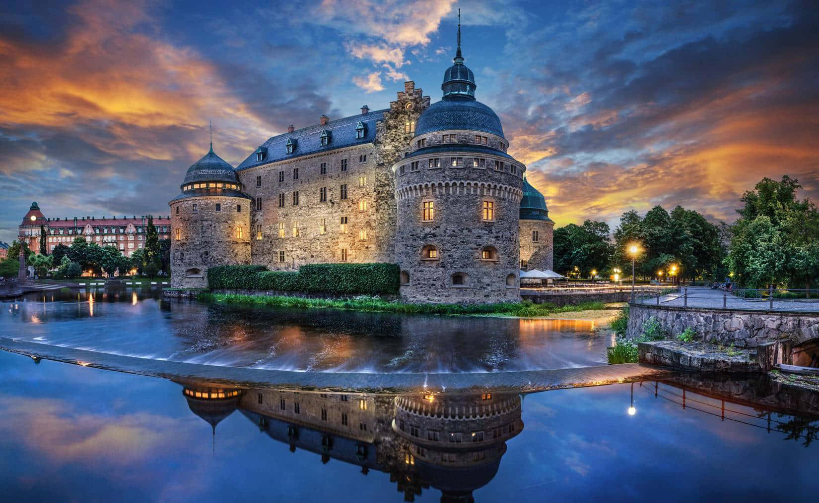 Orebro Castle Sunset Reflection Sweden Wallpaper