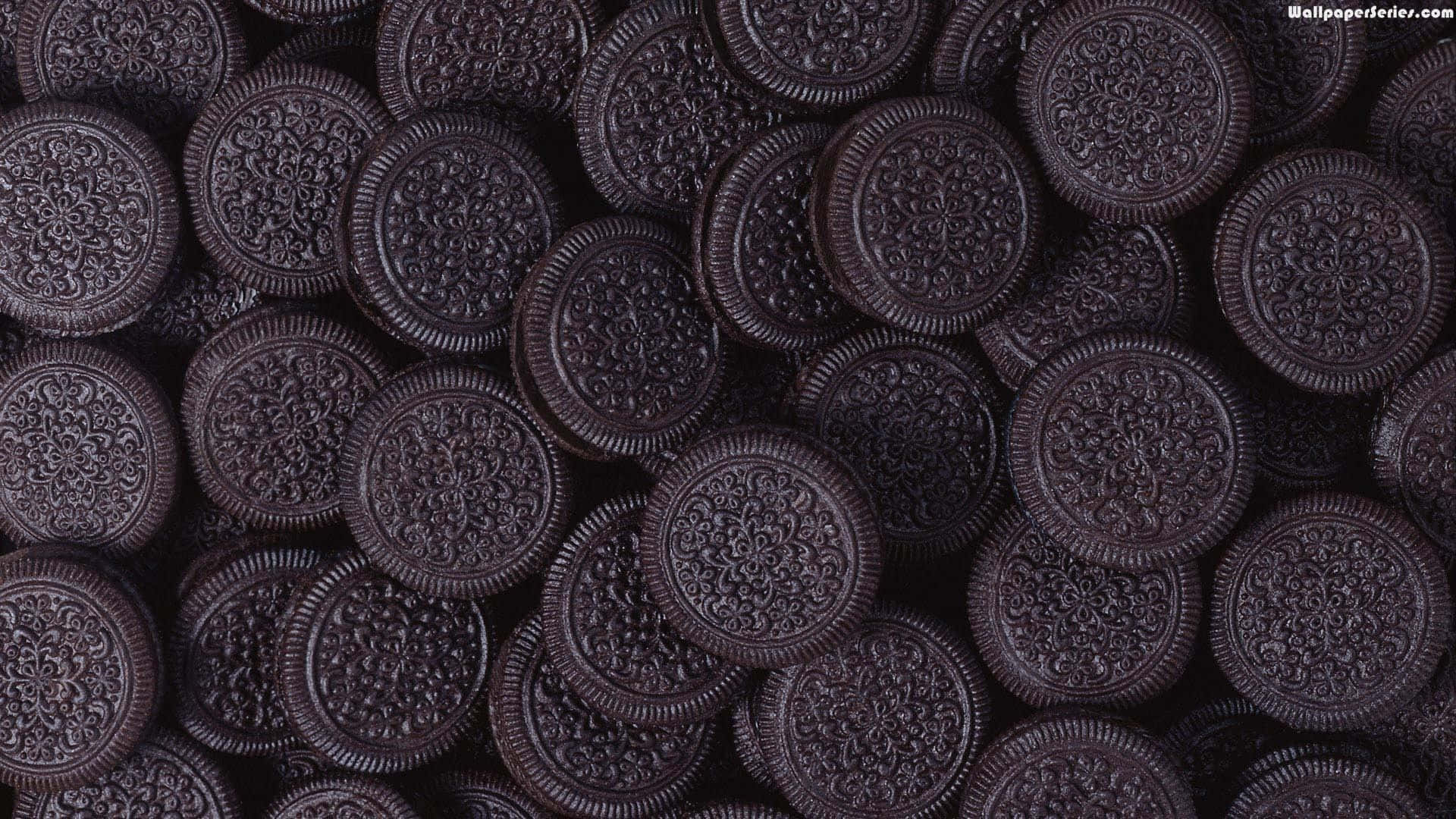 Oreo Cookies On A Black Background Wallpaper