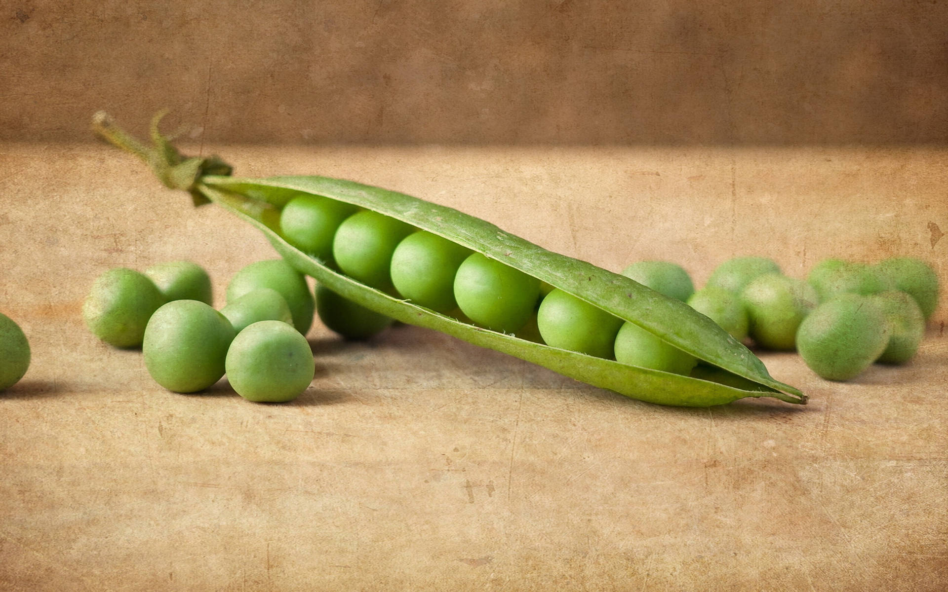 Organic Vegetable Green Peas With Half Opened Pod Wallpaper