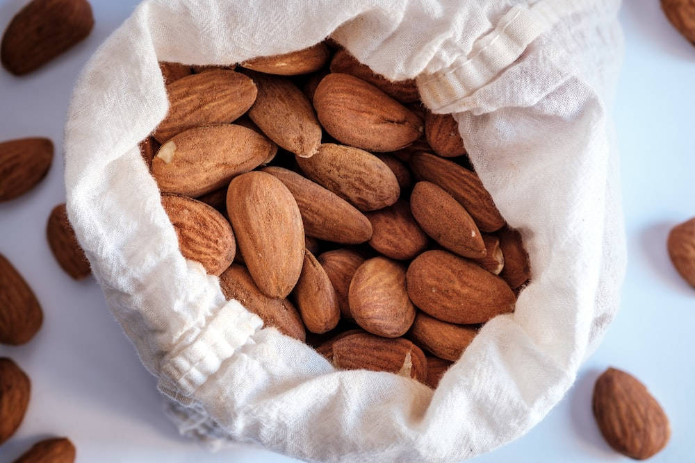 Organic Whole Almond Nuts Wallpaper