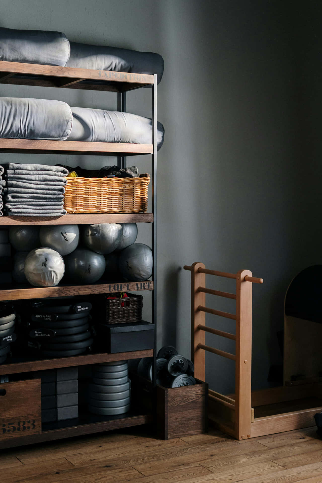 Organized Home Gym Equipment Shelving Wallpaper