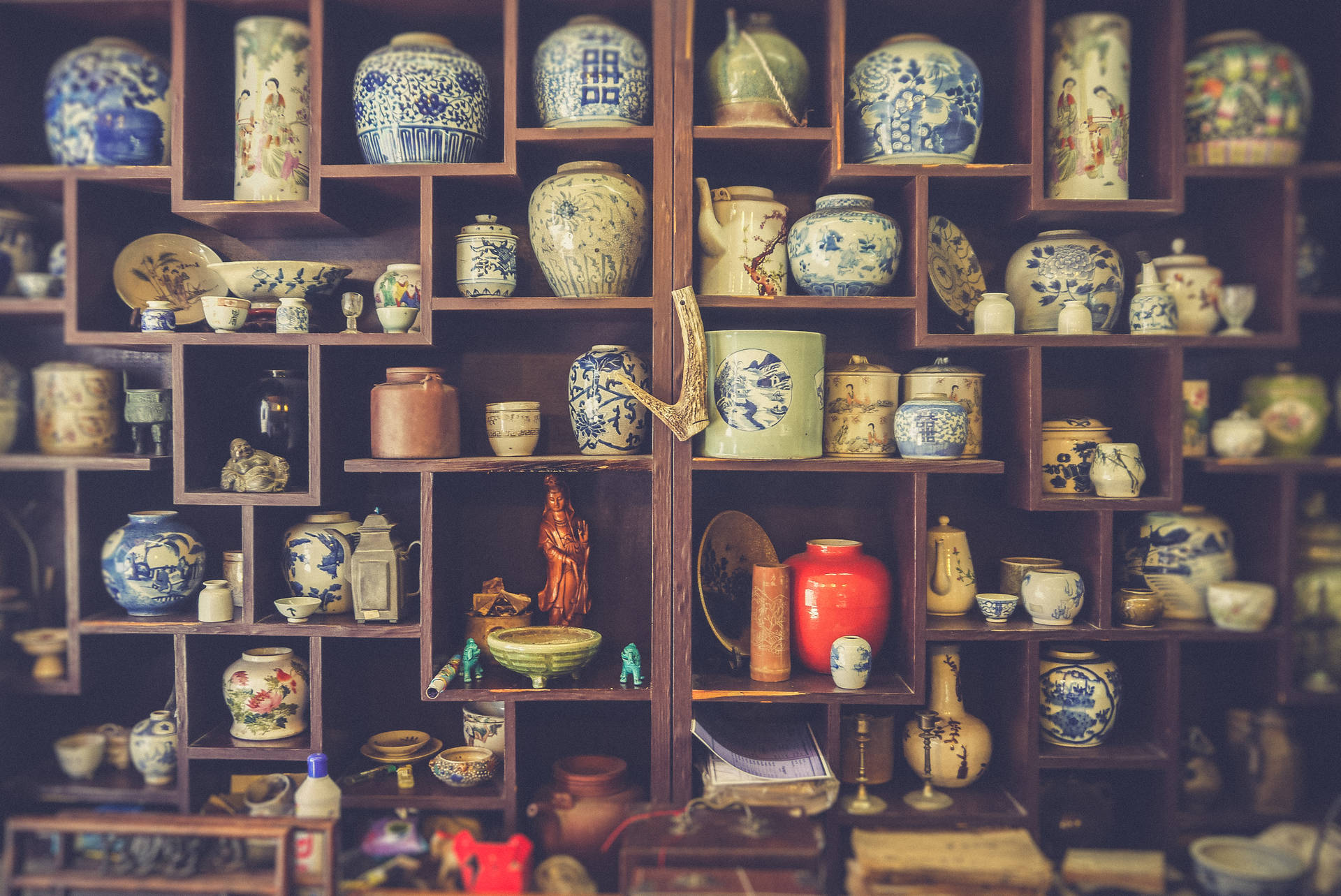 Oriental Ceramics On Shelves Wallpaper