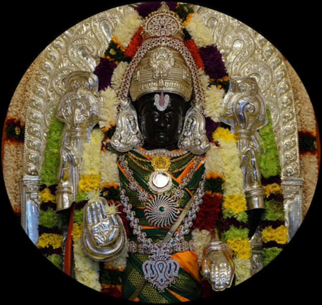 Ornate_ Hindu_ Deity_ Idol_ Decorated_with_ Flowers_and_ Jewelry PNG