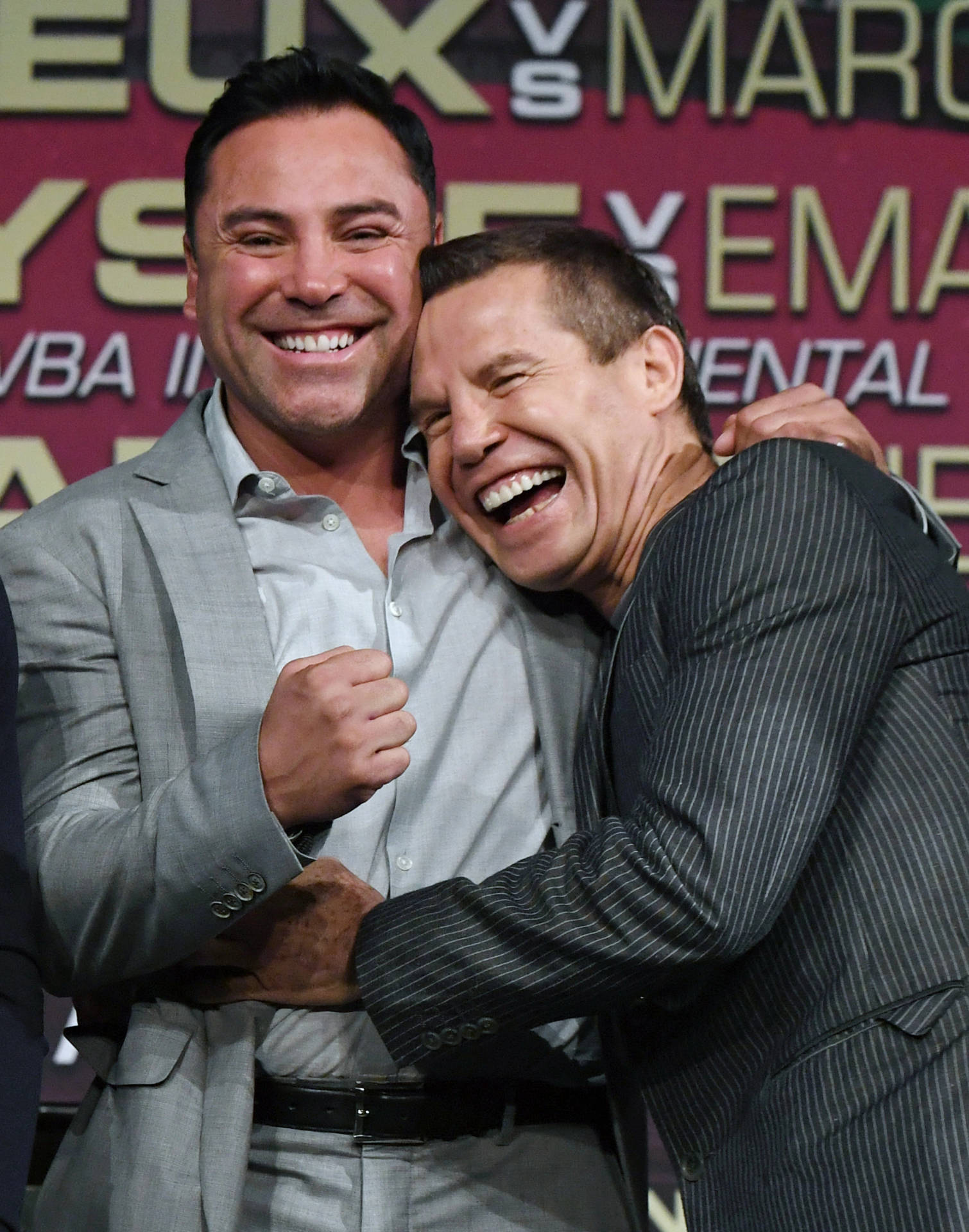 Oscar De La Hoya Laughing With Chavez Wallpaper
