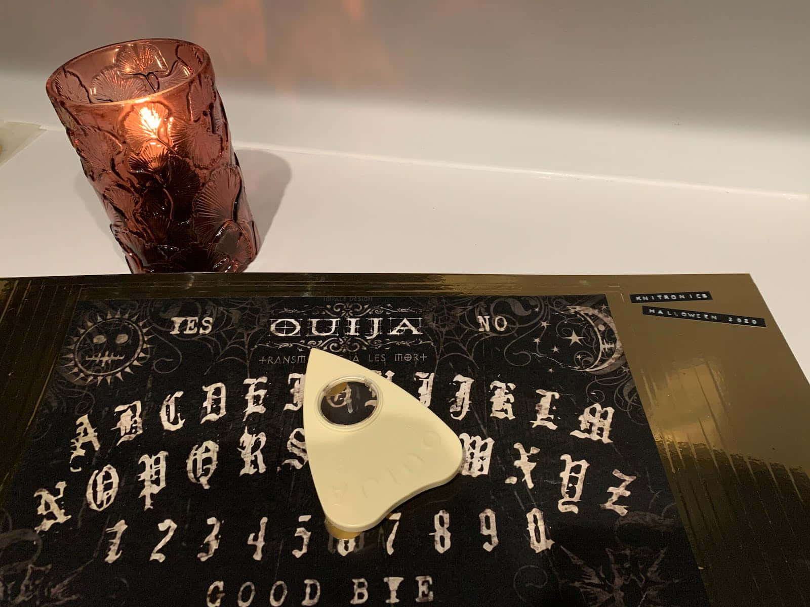 Ominous Ouija Board Ready for a Supernatural Session