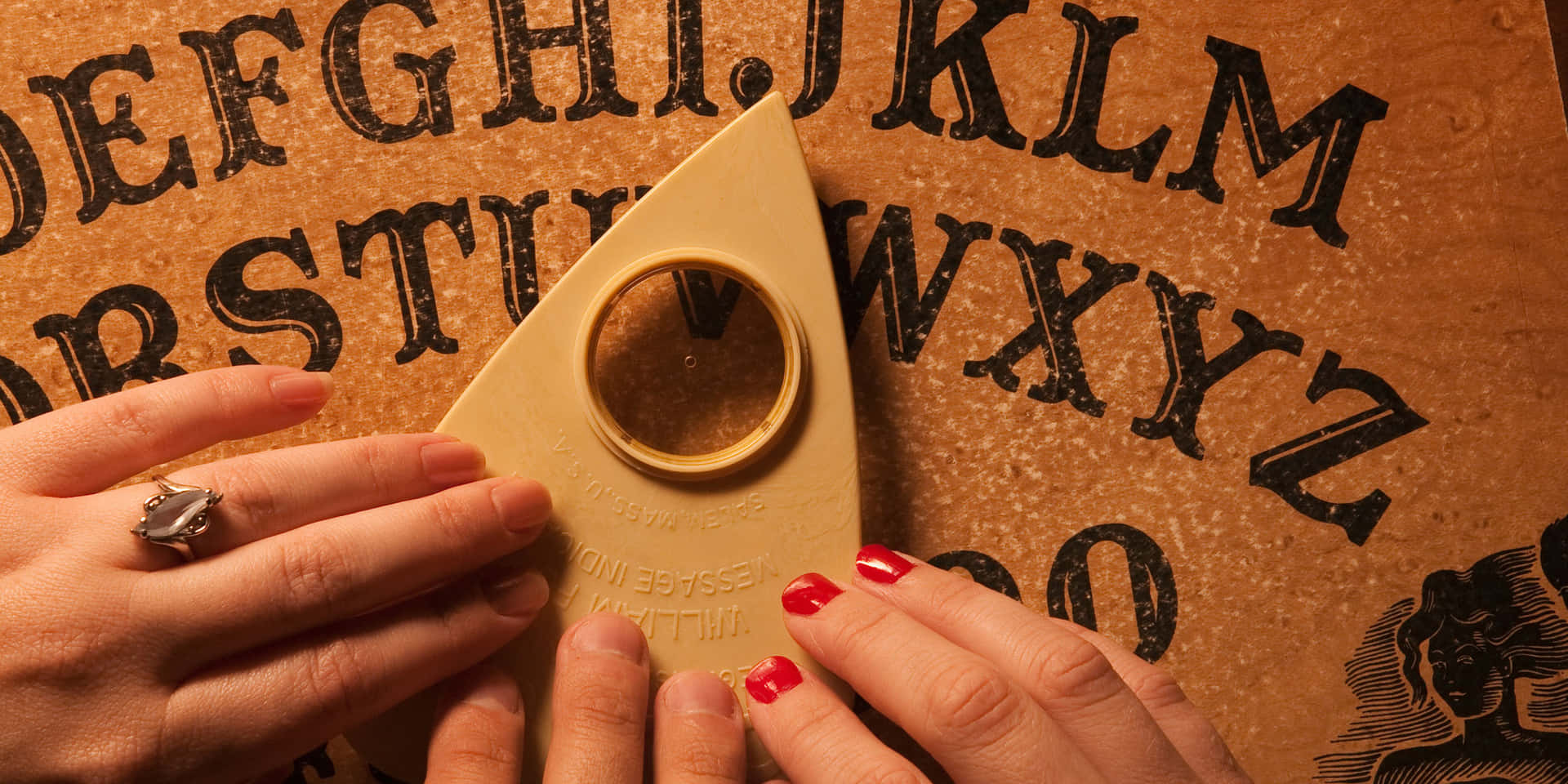 "Take the plunge into the paranormal realm with a Ouija board!"