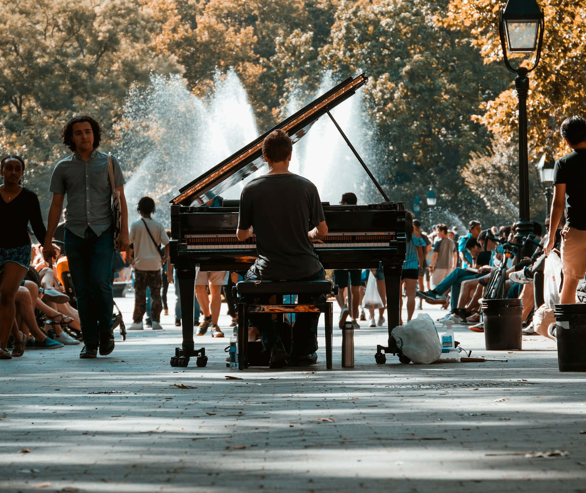 Outdoor Piano Performance Park Setting Wallpaper