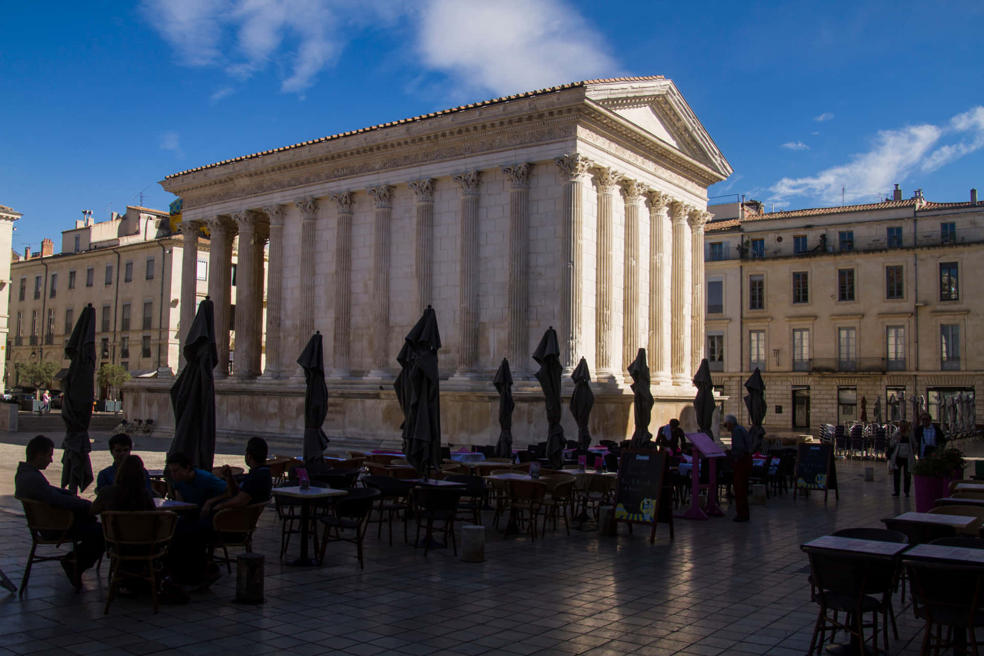 Outdoor Tables Behind Maison Carrée Picture
