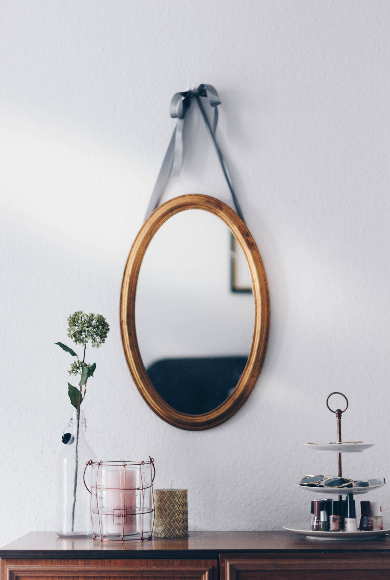 Oval Brown Wooden Framed Hanging Mirror Wallpaper
