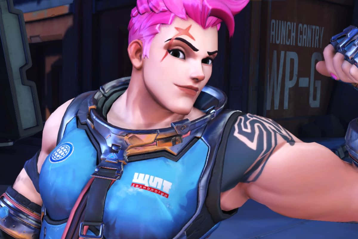 Zarya, the fearsome tank hero from Overwatch, flexes her strength and power in this vibrant wallpaper. Wallpaper