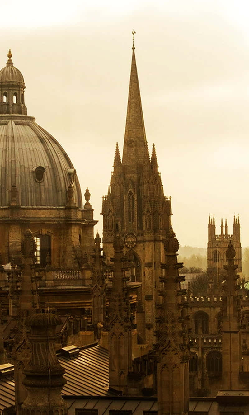 The iconic Oxford University's architecture bathed in sunlight Wallpaper