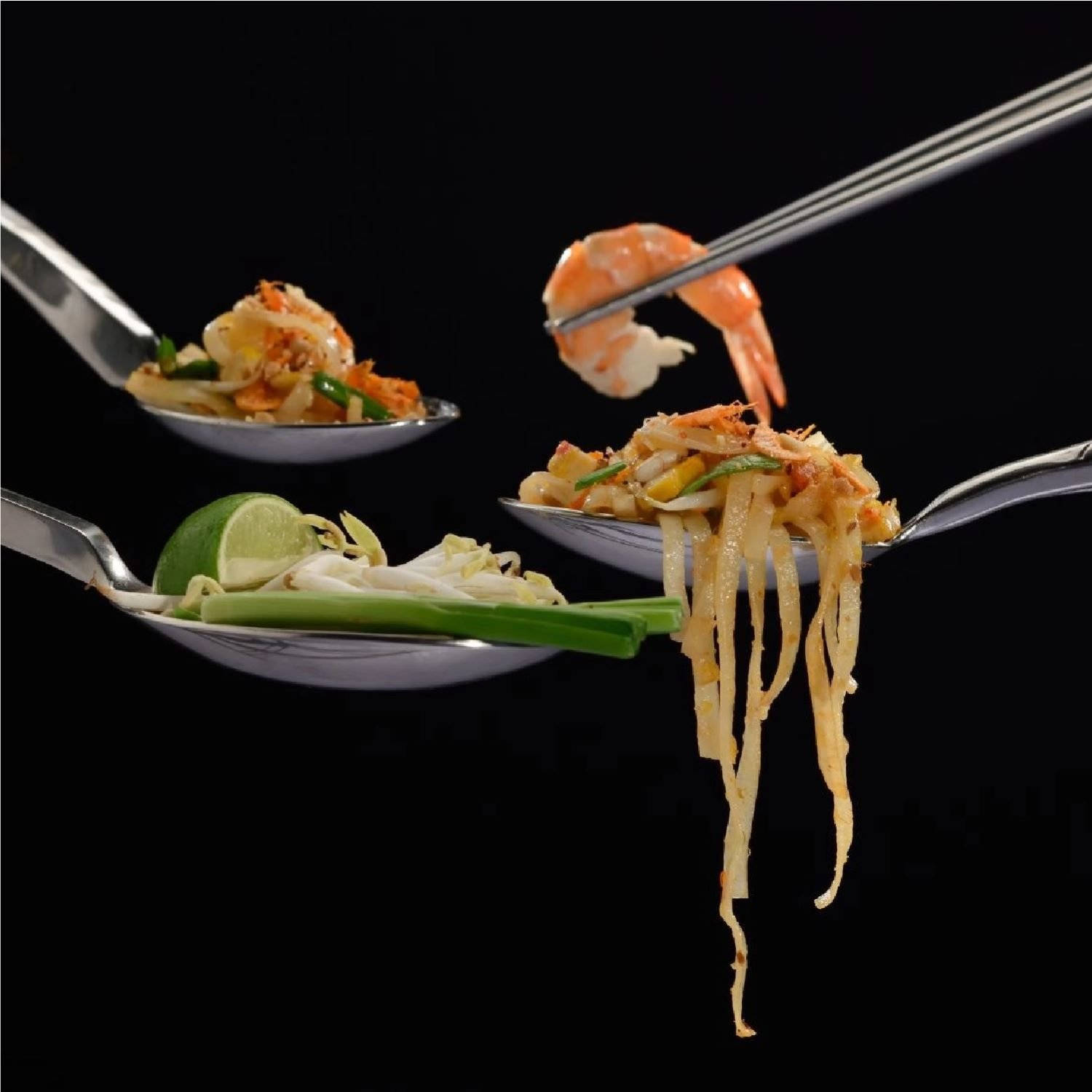 Pad Thai Ingredients On Spoons And Chopsticks Wallpaper