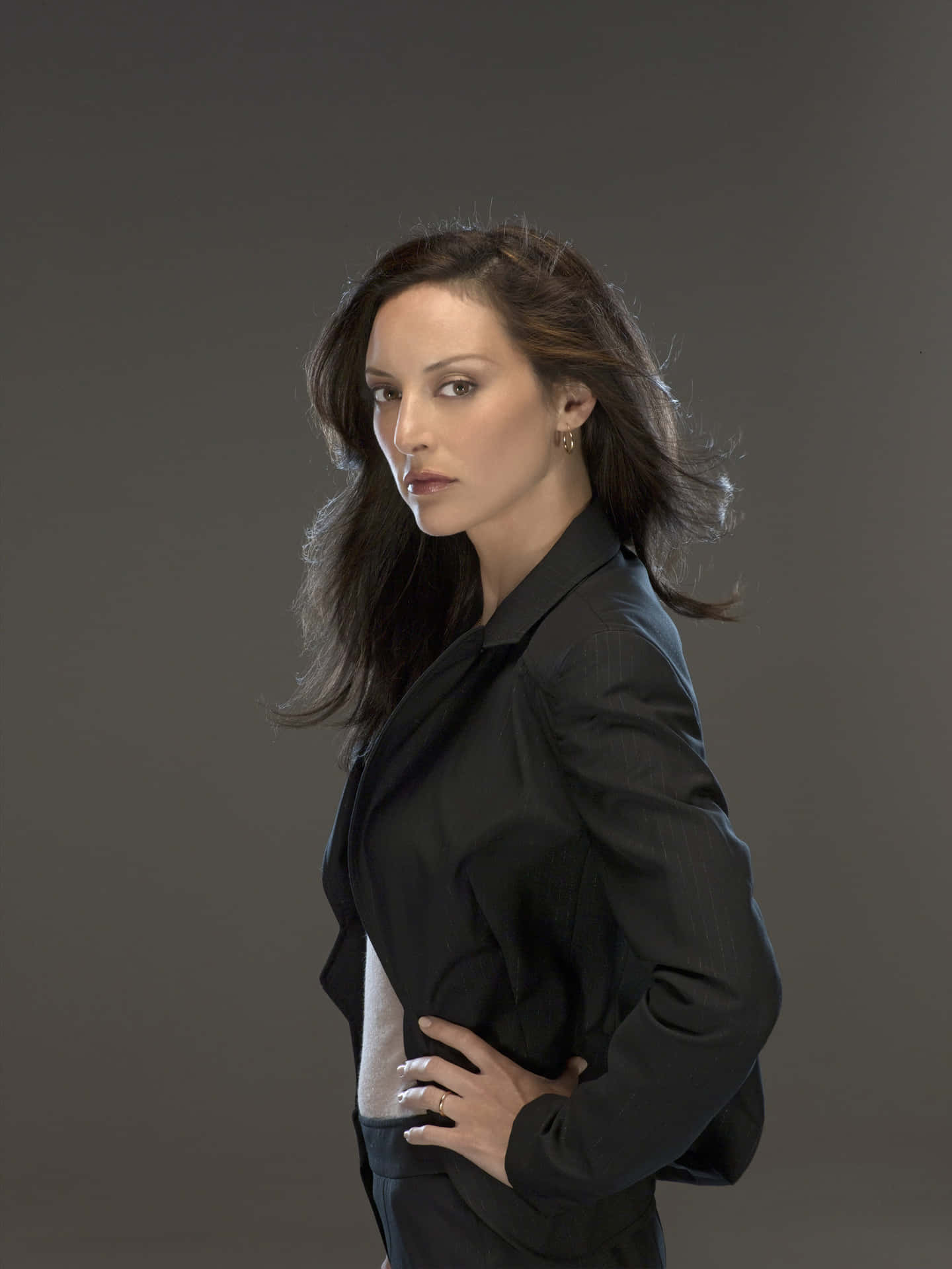 Paget Brewster posing for a portrait Wallpaper