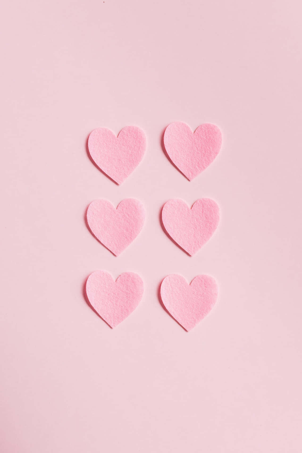 Pale Pink Background Hearts Vertically