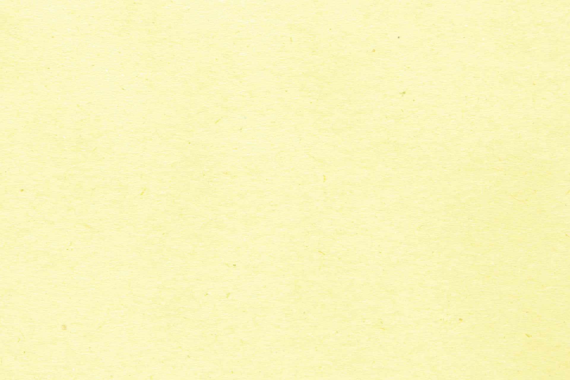 A Yellow Paper Background With A White Background