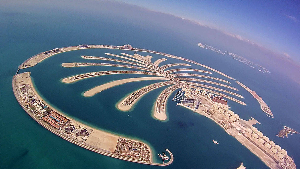 Caption: A Stunning Aerial View of the Palm Island in UAE Wallpaper