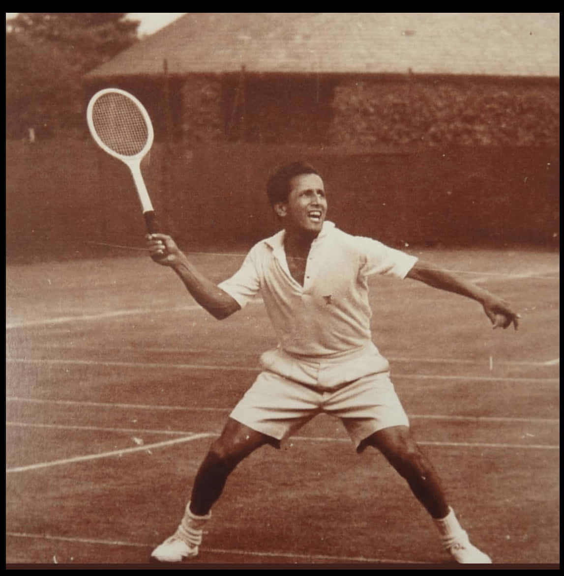 Legendary Tennis Player Pancho Segura in Action Wallpaper