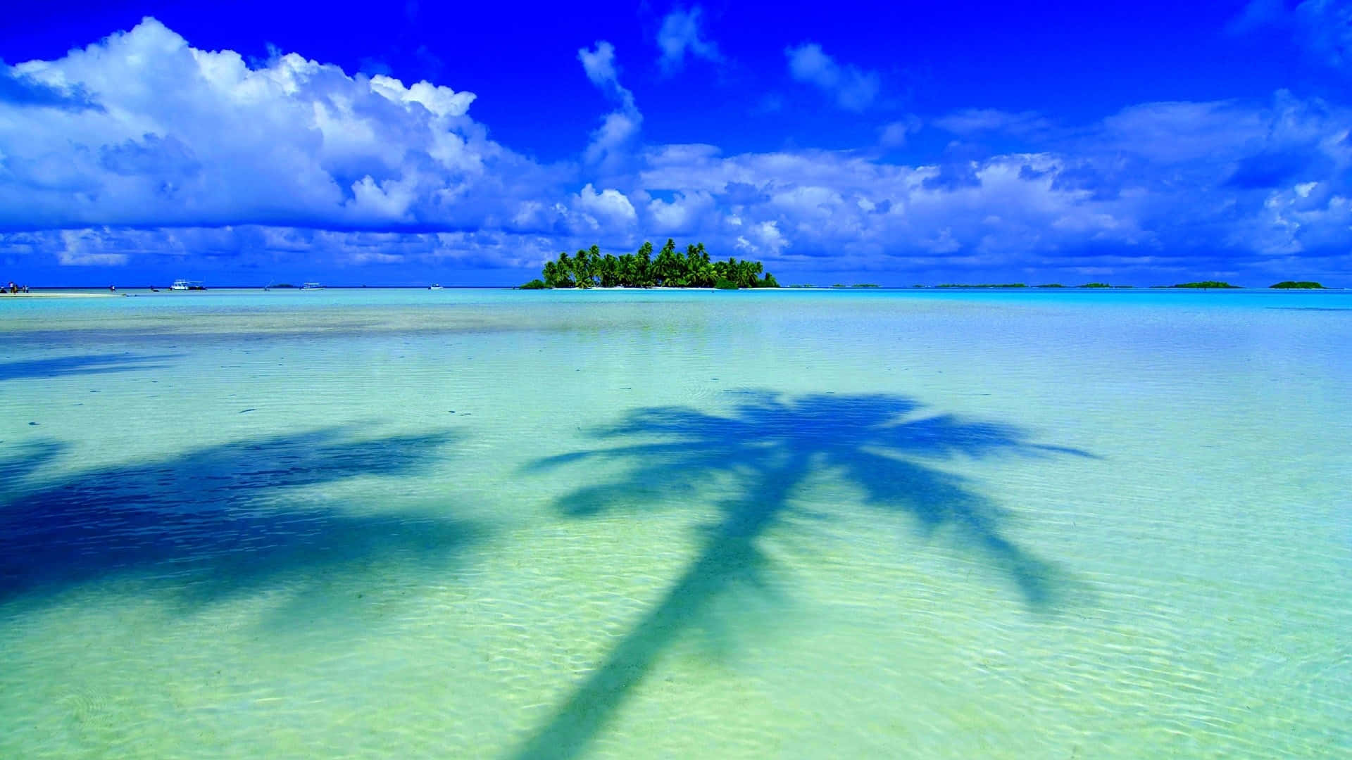 Sfondopanoramico Desktop Dell'isola Tropicale Blu Sfondo