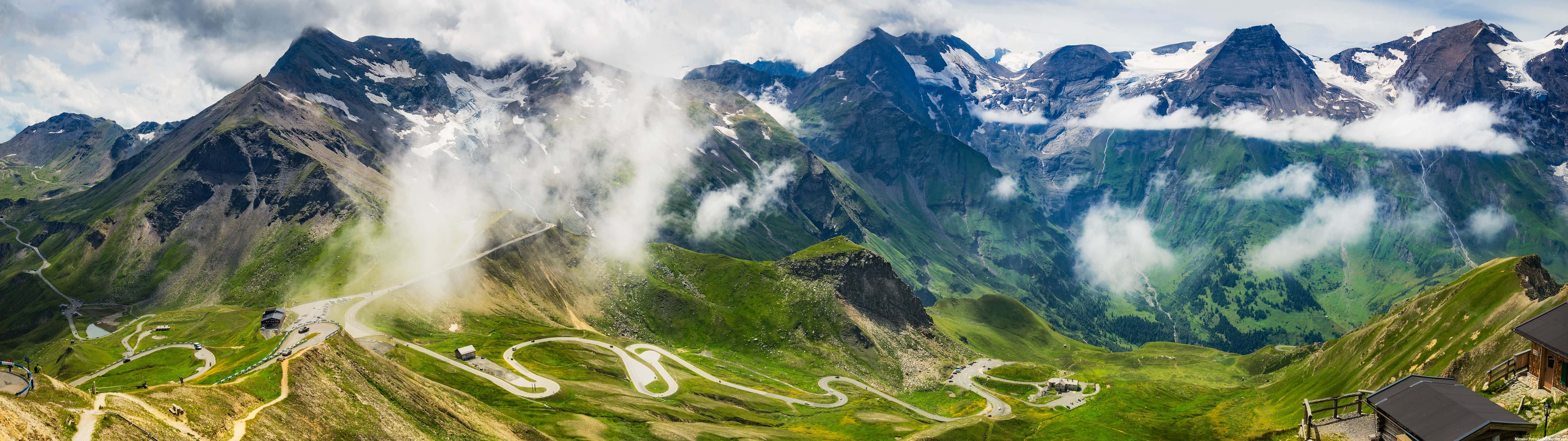 Panoramic_ Mountain_ Pass_with_ Clouds Wallpaper