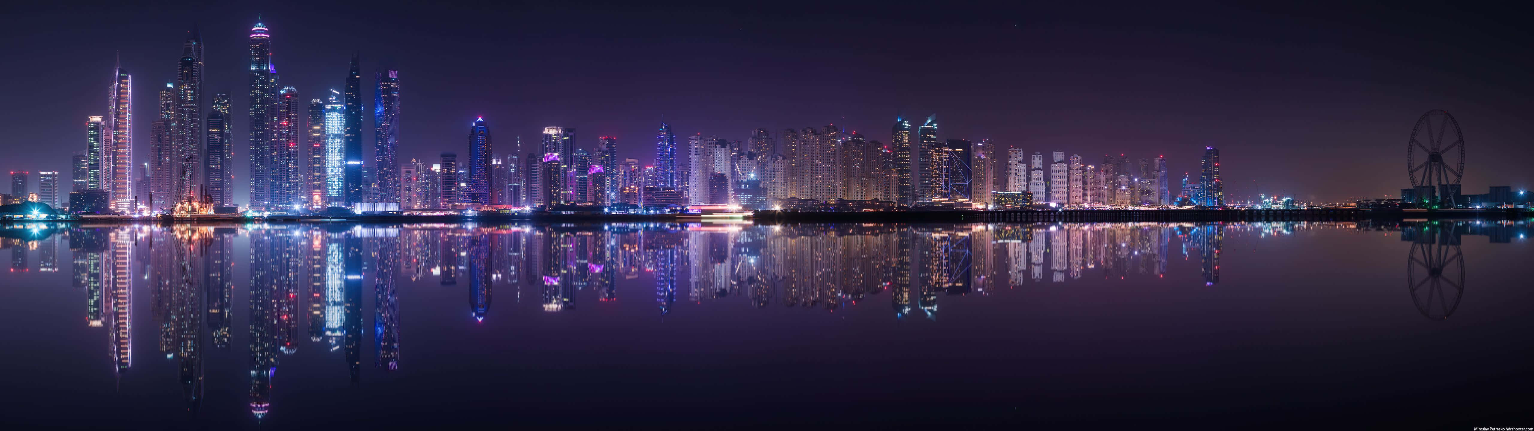 Panoramic Nighttime Cityscape Reflection Wallpaper