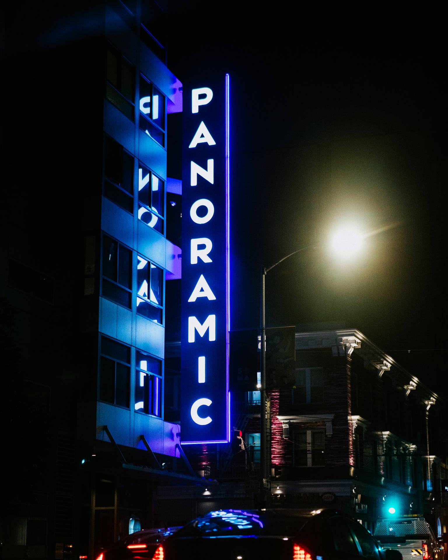 Panoramic Signage In Neon Blue iPhone Wallpaper