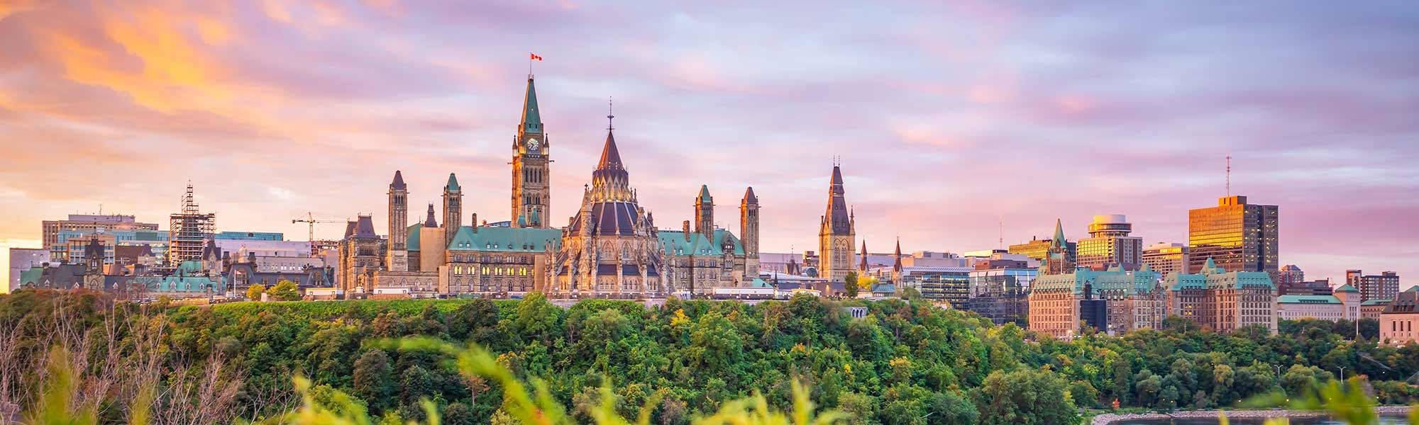 Panoramic View Of Parliament Hill In Ottawa Wallpaper