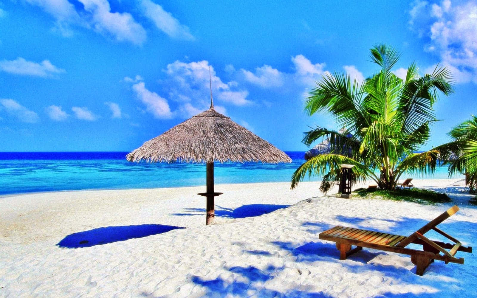 Immaginedi Una Spiaggia Con Ombrellone Di Paglia