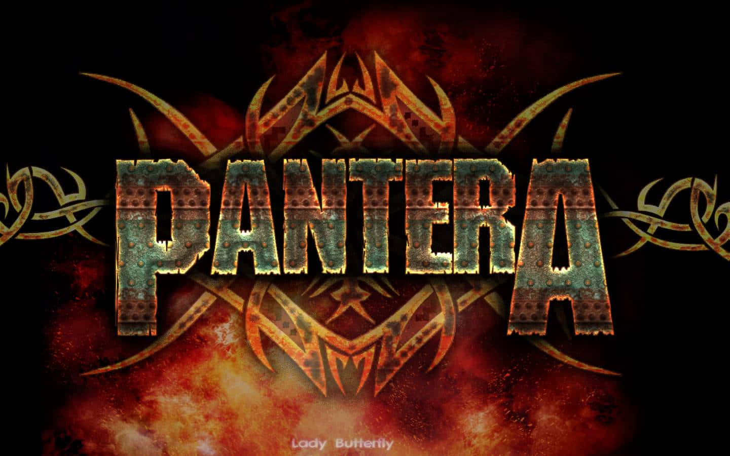 Pantera - A Logo With A Flame And A Skull Wallpaper