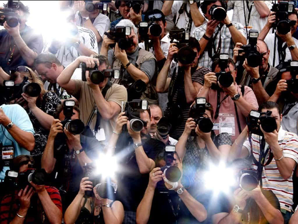 Paparazzi in action during a red carpet event