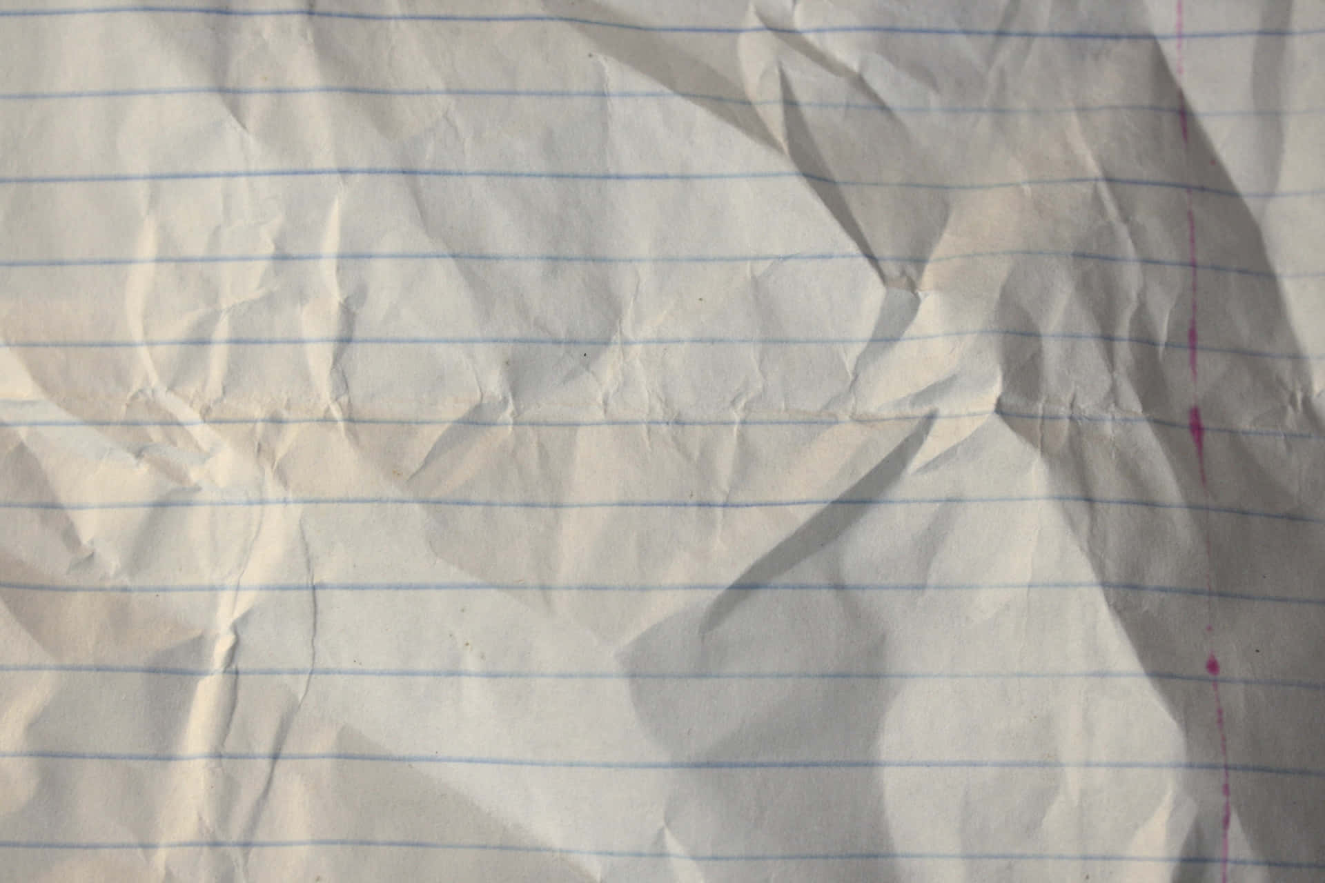 A Piece Of Paper With A Tear In It