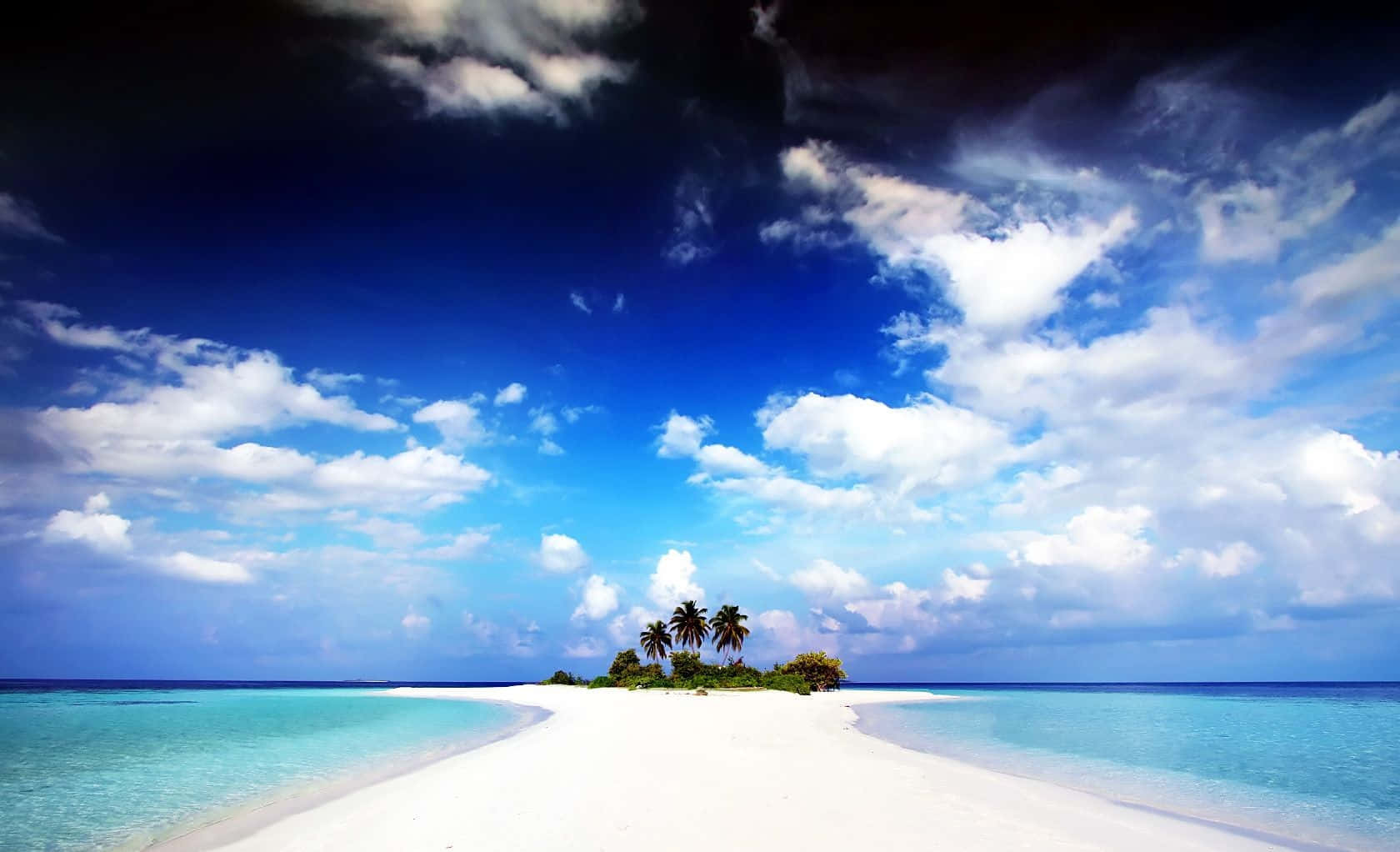 A White Sandy Island With Palm Trees And Blue Sky