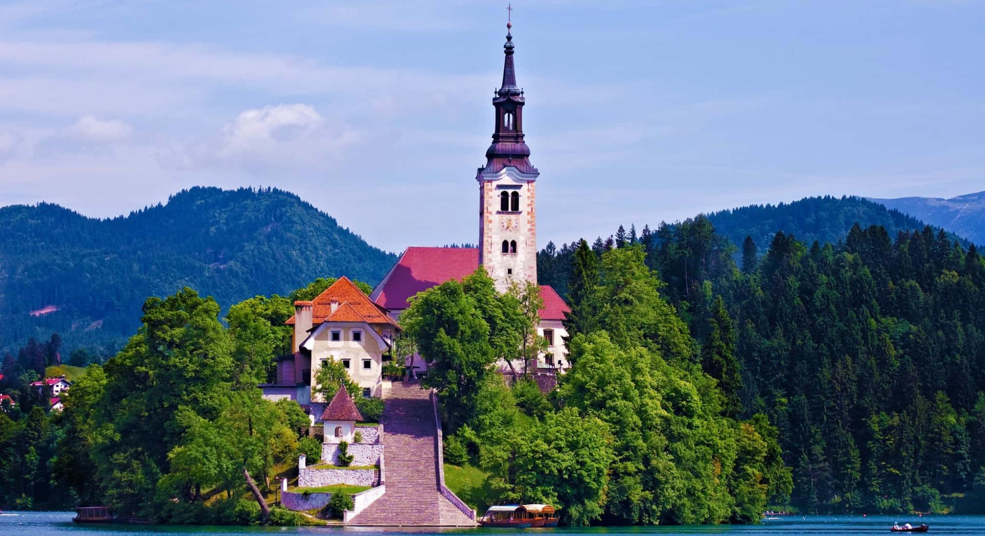 Parallel View Of The Church In The Middle Of Lake Bled Wallpaper