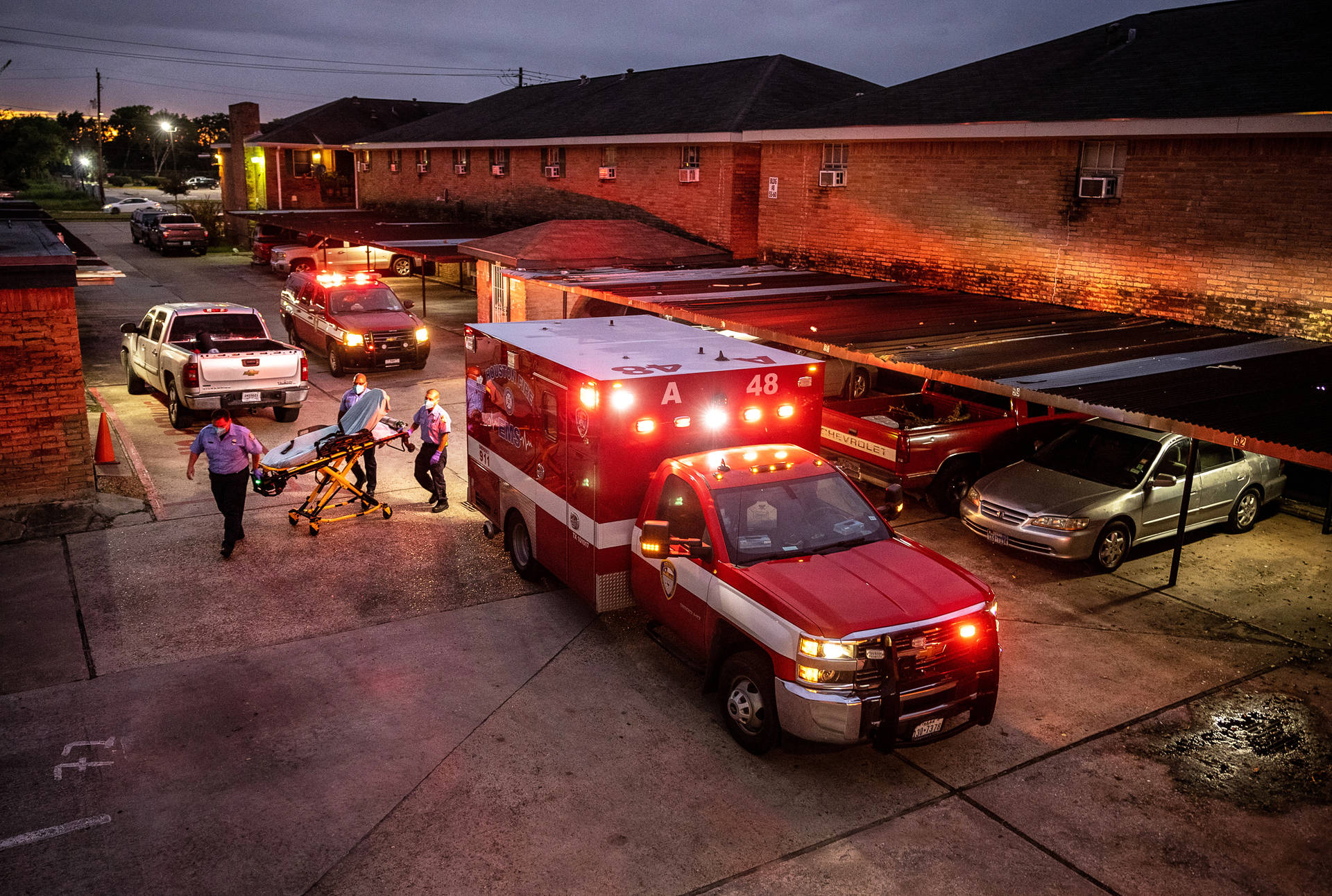 Paramedic Rescuing Scenario Wallpaper