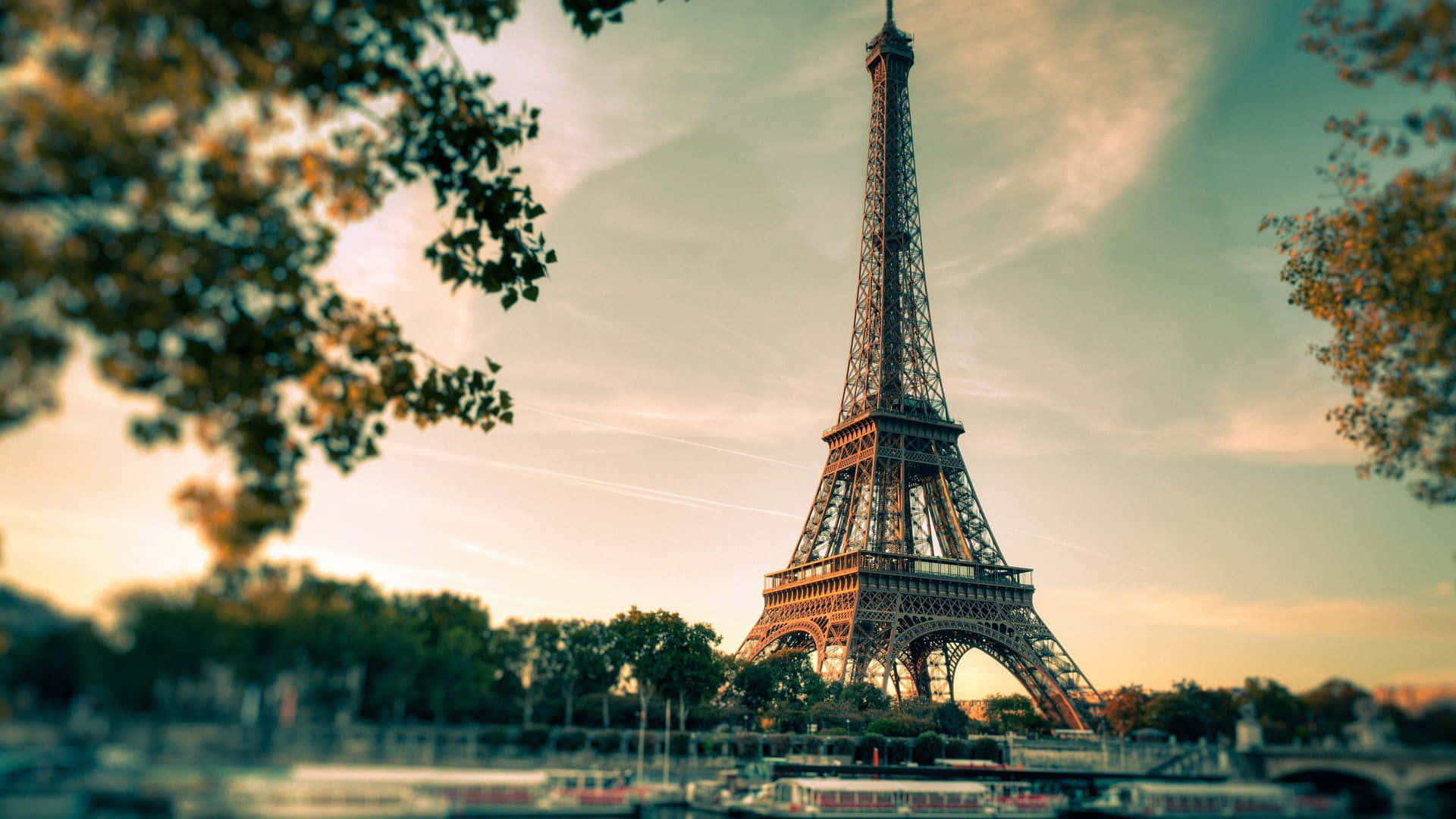 View of the beautiful Eiffel Tower in sunny Paris, France Wallpaper