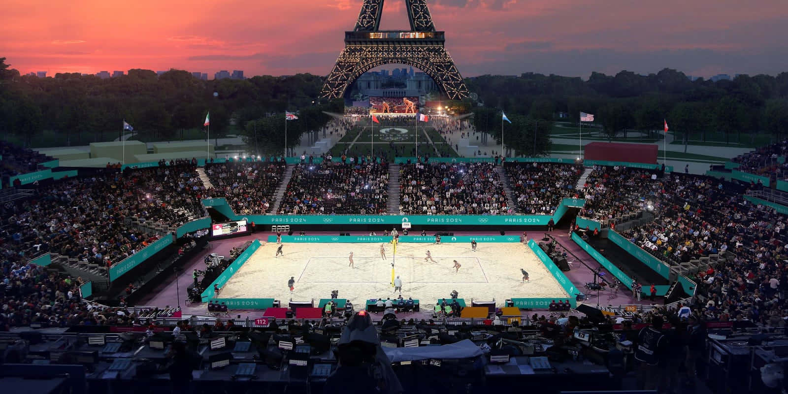 Paris Olympics2024 Eiffel Tower Volleyball Match Wallpaper