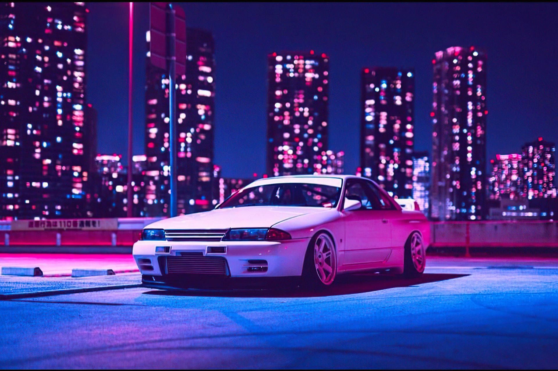 Parked Car And Neon Lights Wallpaper