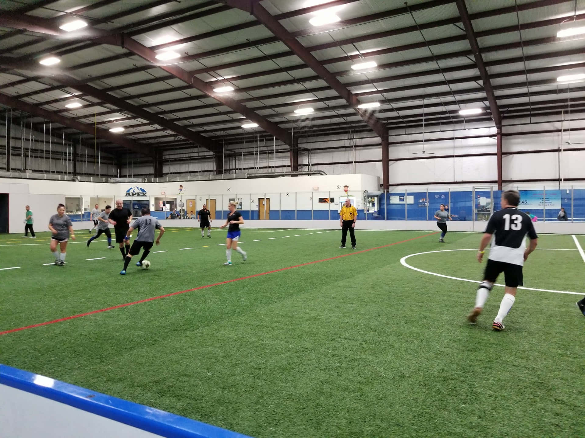 Passionate Indoor Soccer Play Wallpaper