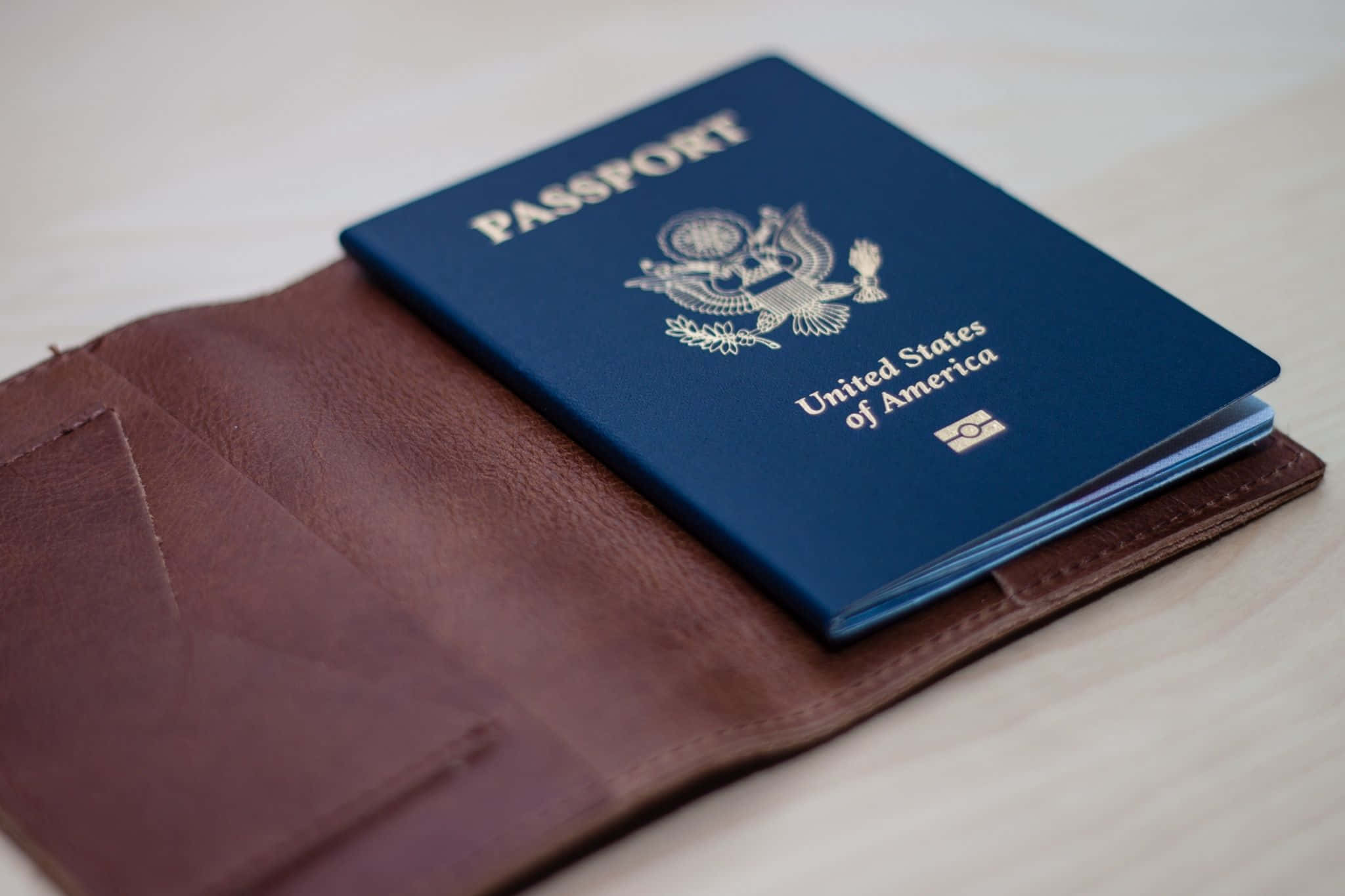 A Passport Is Sitting On A Table