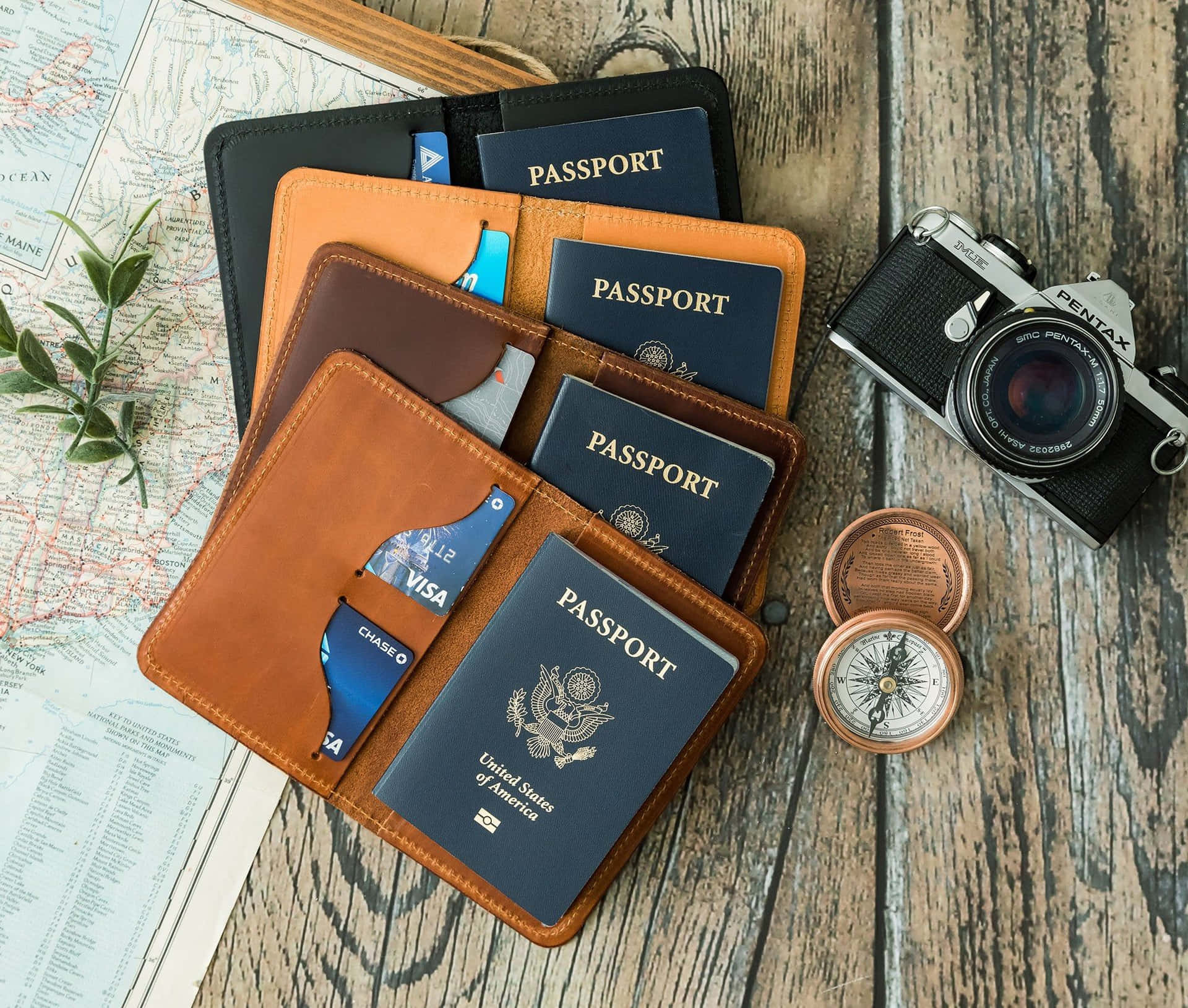 A Passport Holder With A Camera And A Map