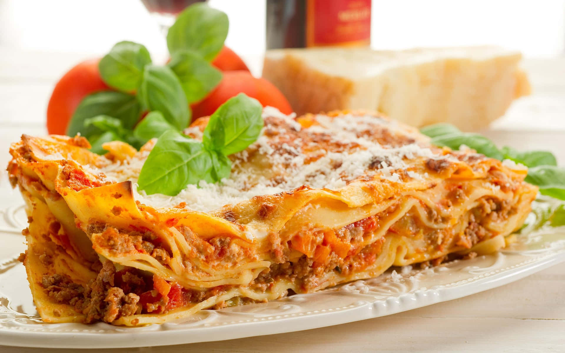 A Plate Of Lasagna With Meat And Vegetables