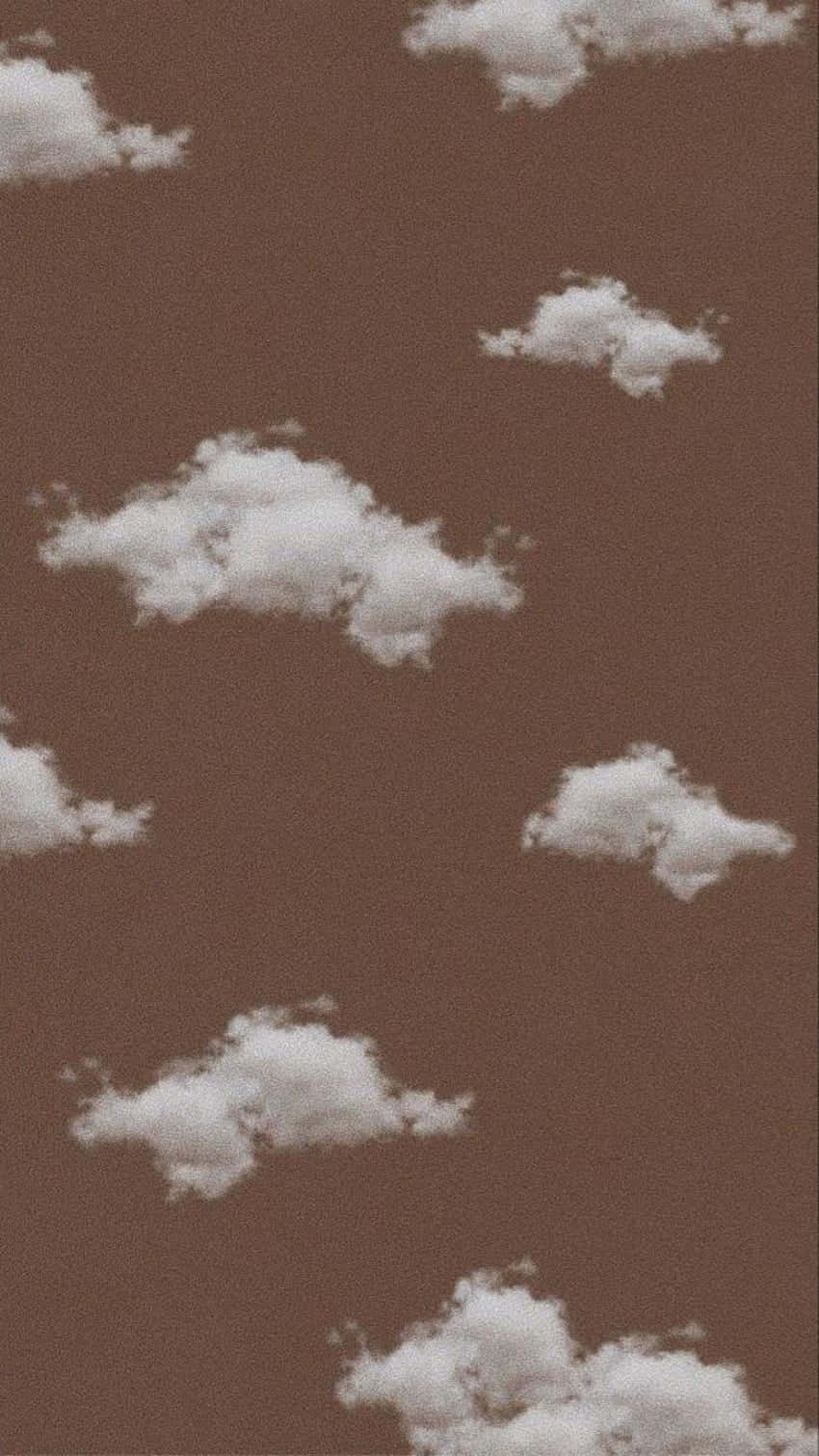 A Brown And White Wallpaper With Clouds On It