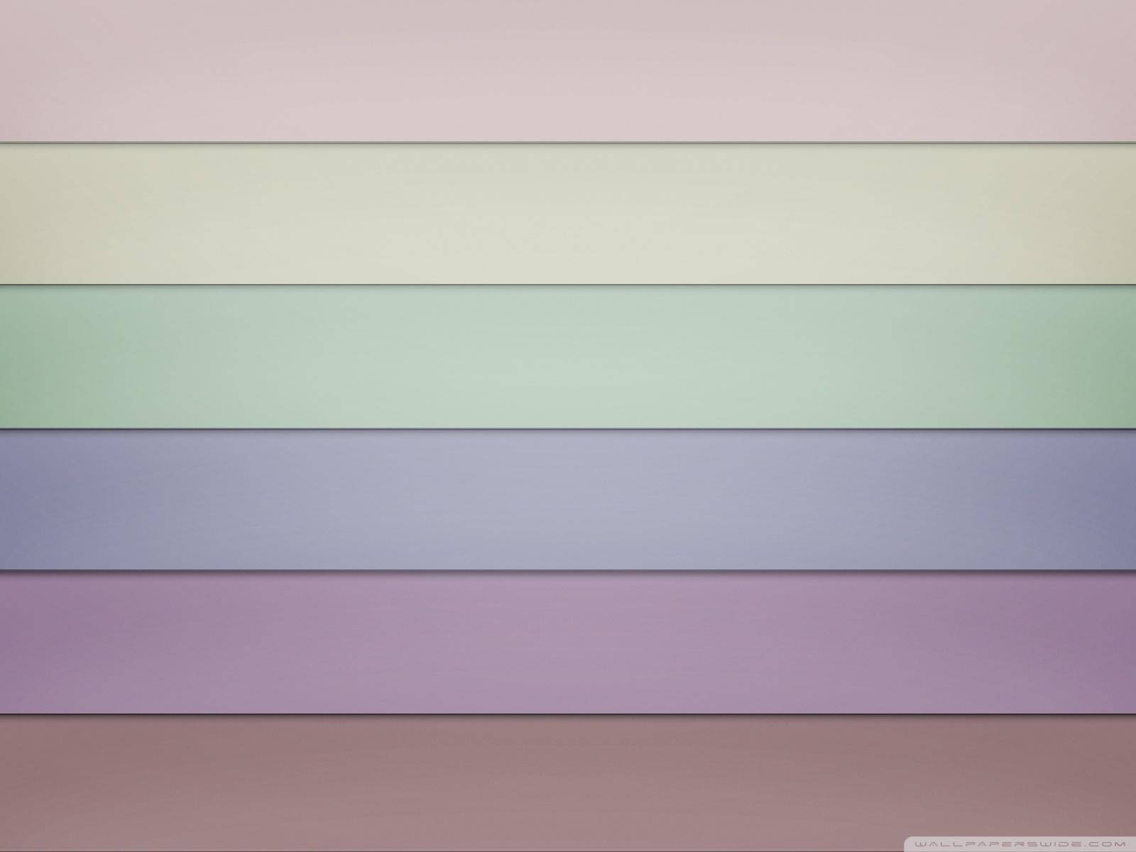 En farverig baggrund med et regnbue af farver Wallpaper