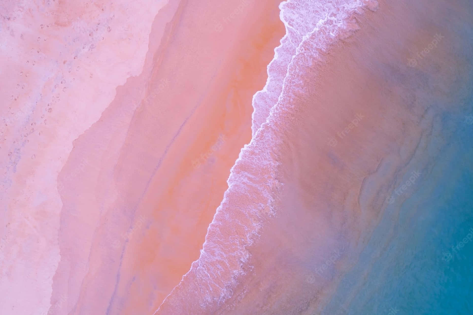 Nyd det smukke, pastelfarvede solnedgang ved stranden. Wallpaper