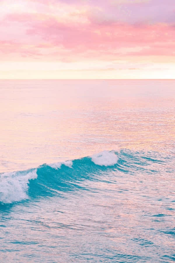 Explore den skønhed af en fredfyldt pastel strand Wallpaper